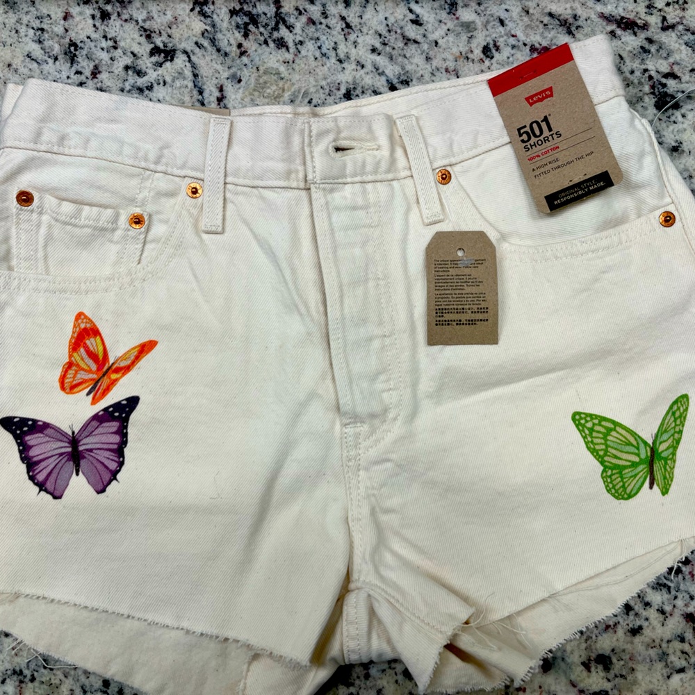 Women’s Levi white denim shorts with butterfly detail new with tag size 28